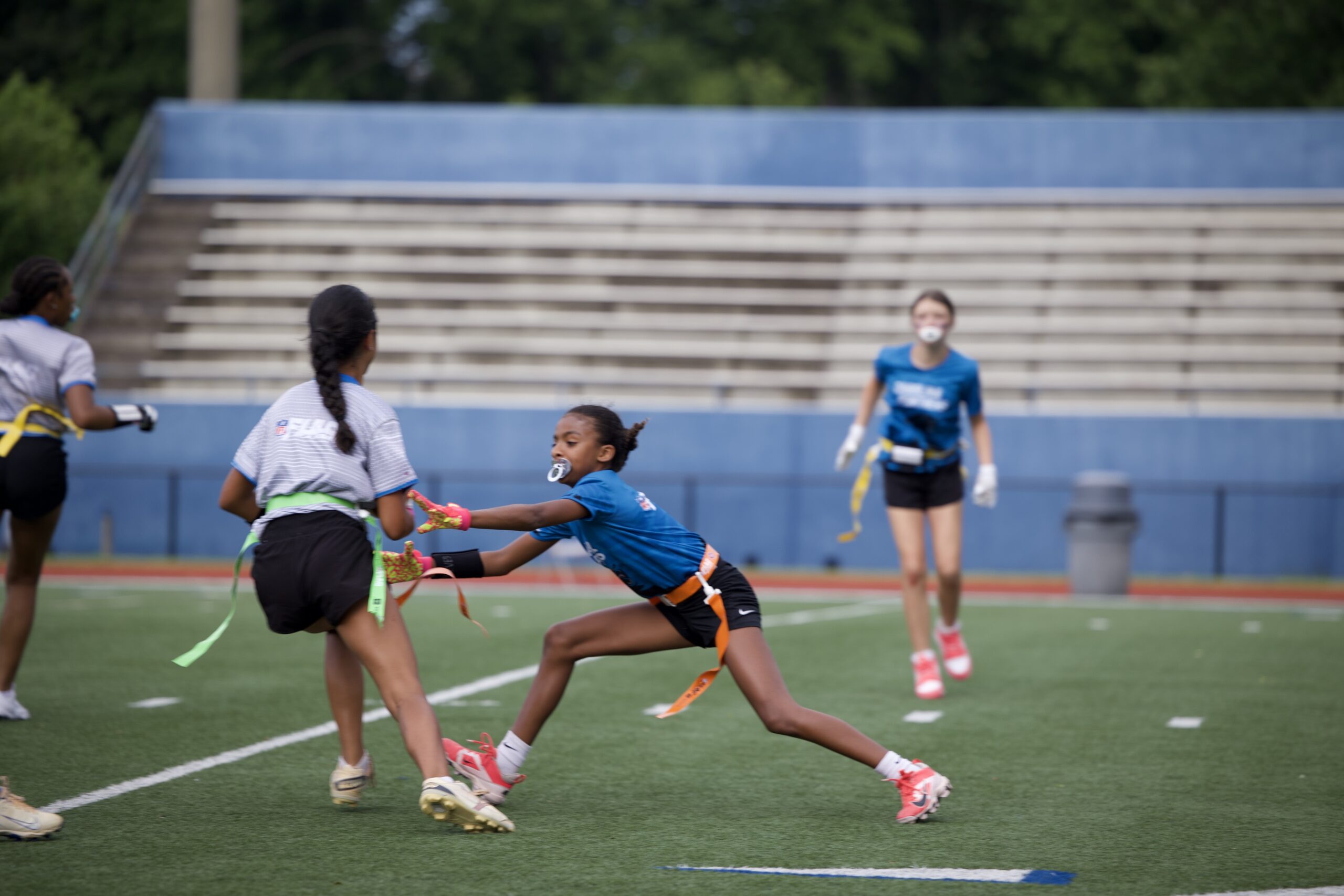 Girls playing flag football with GirlPower Carolinas in the Charlotte NC area