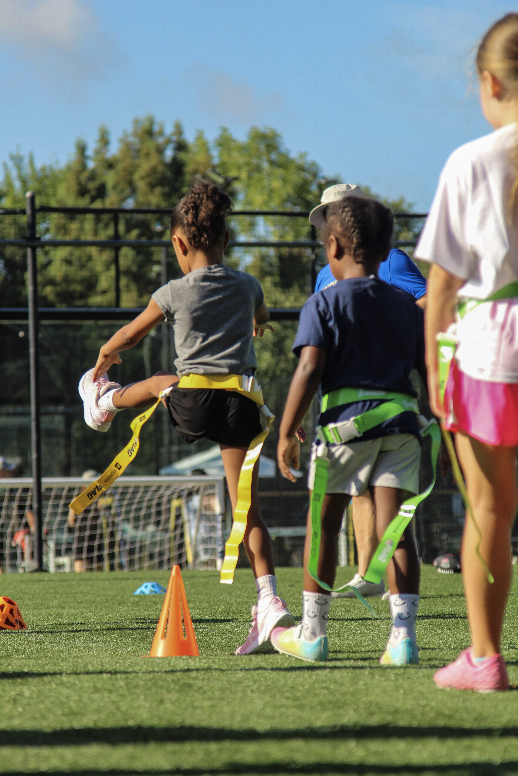 Girls participating in a GirlPower Carolinas flag football clinic in Charlotte NC